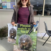 Staf member at community event